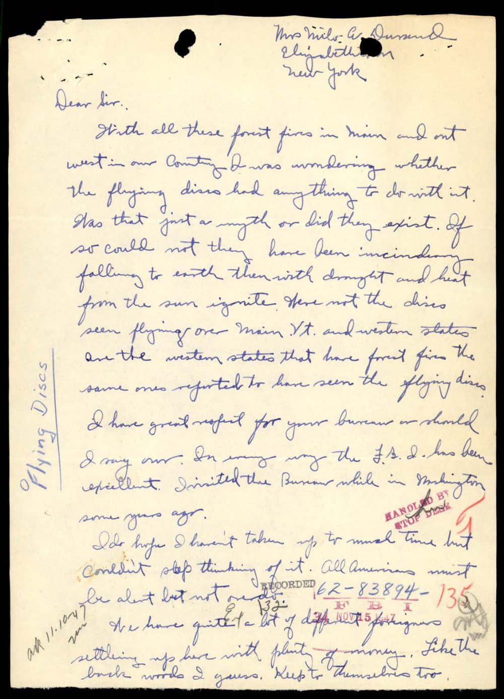 Carta manuscrita em tinta azul com anotação lateral Flying Discs.