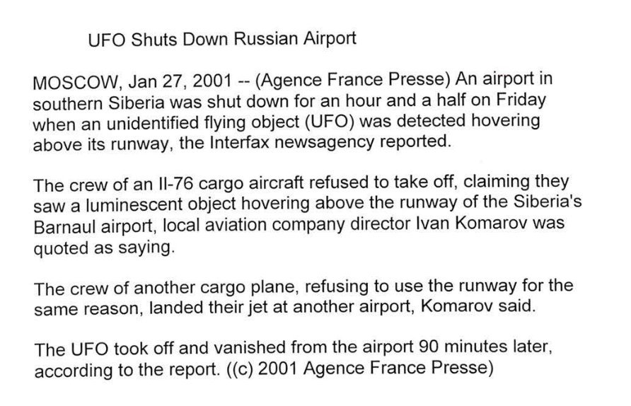 Página com texto curto em quatro parágrafos sob o título UFO Shuts Down Russian Airport.