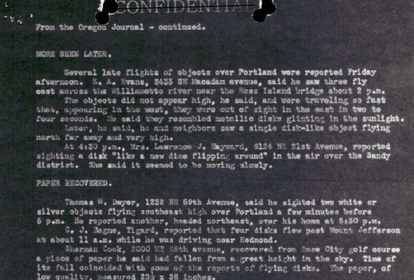 Página datilografada com carimbo Confidential riscado e o título From the Oregon Journal - continued, com parágrafos sobre relatos de discos em Portland.
